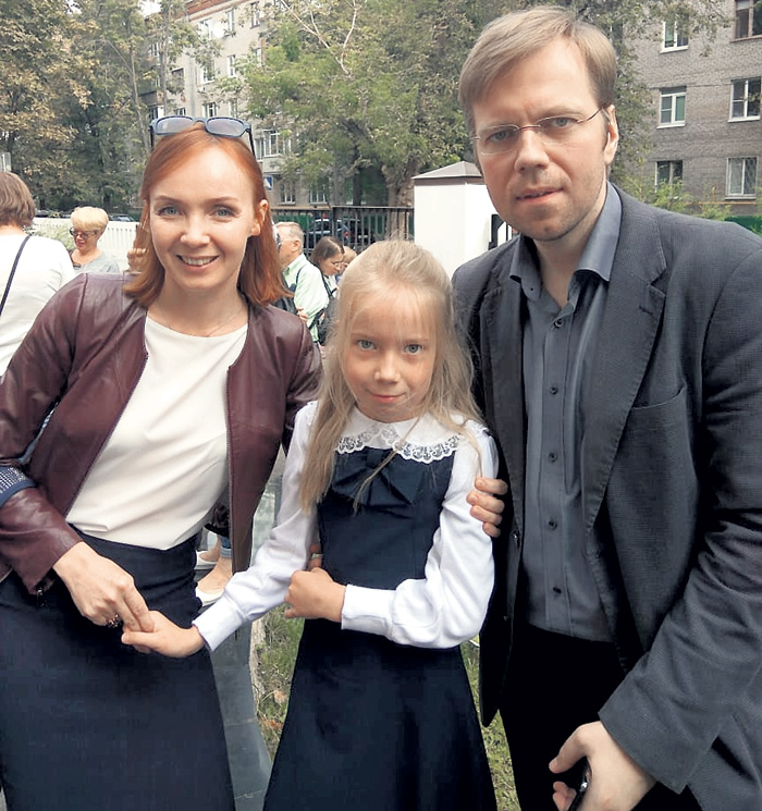 С мужем Алексеем и их дочкой Таней